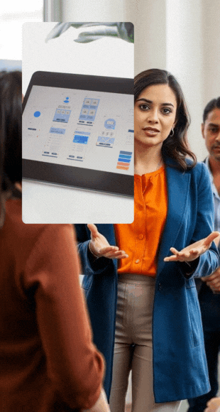 A woman presents to a group in a modern office setting, engaging them in a new website project design discussion.