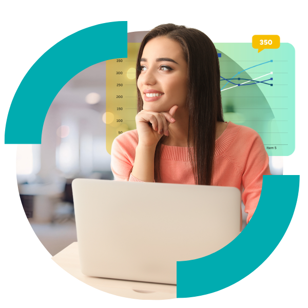 A woman is seated at a desk with a laptop, reviewing a graph for website restoration analysis.